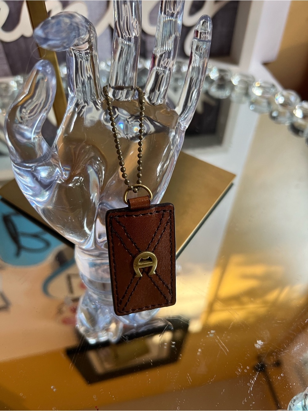 Etienne Aigner vintage  brown leather and brass logo hangtag keychain